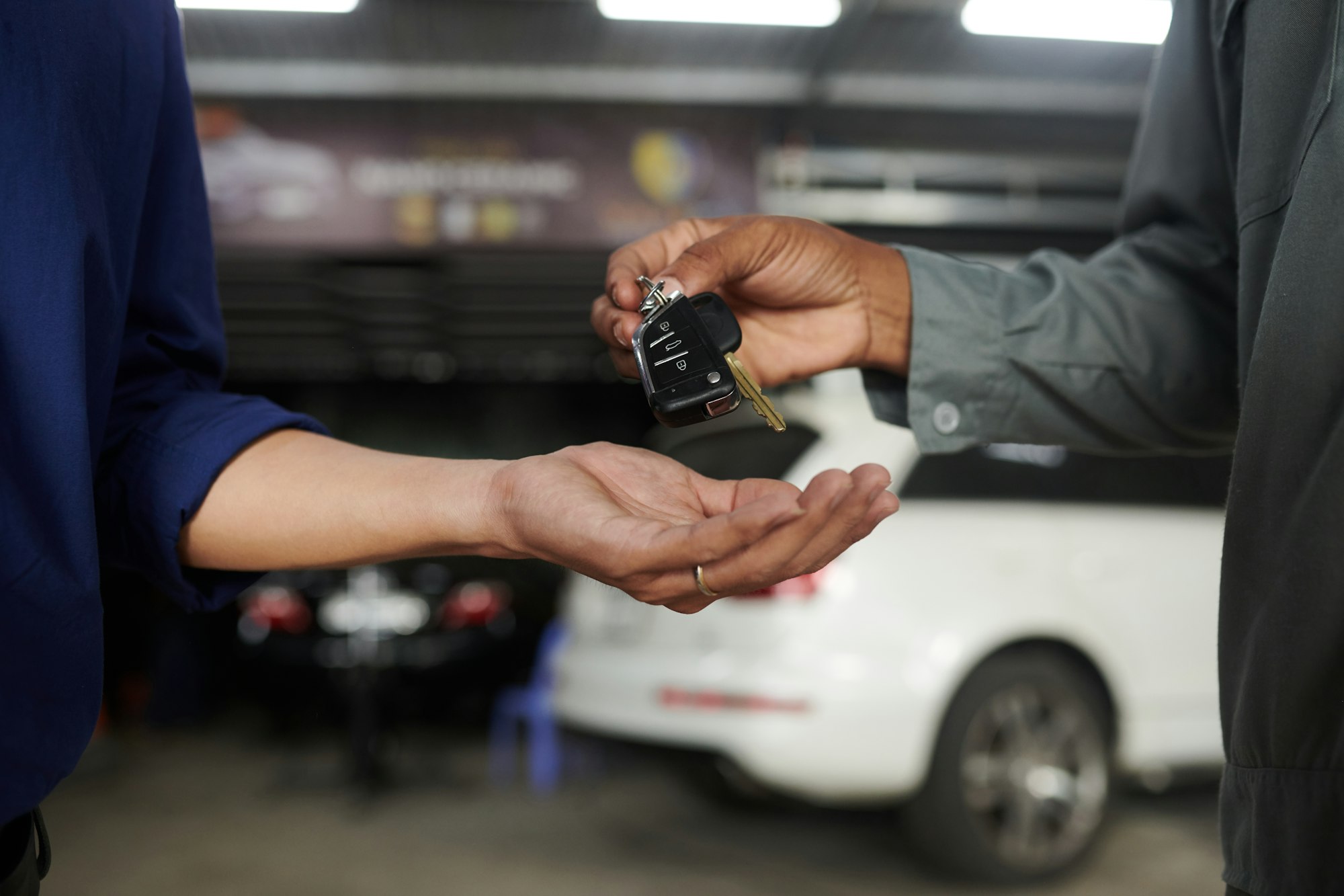 Car Mechanic Giving Keys