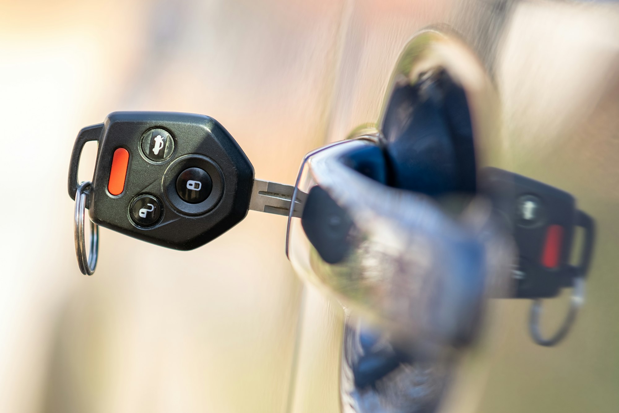 Close Up Of Car Door With Key Sticking Out Of The Lock. Concept Of Process Opening Or Closing